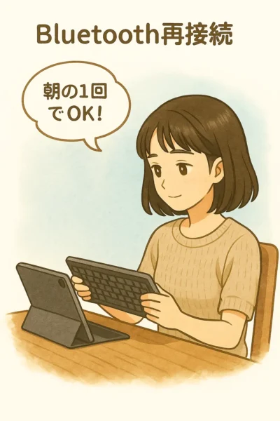 まなみが静かな朝、机の上でiPadとキーボードを接続中。